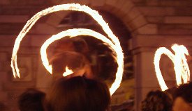 Juggling with fire 
sticks