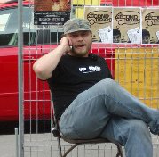 GM Geoff on phone
at beer fence gate