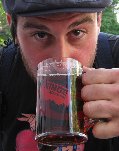 Manny drinking from Fringe Mug